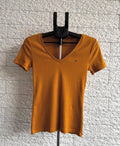 Camiseta tommy hilfiger mostaza cuello v